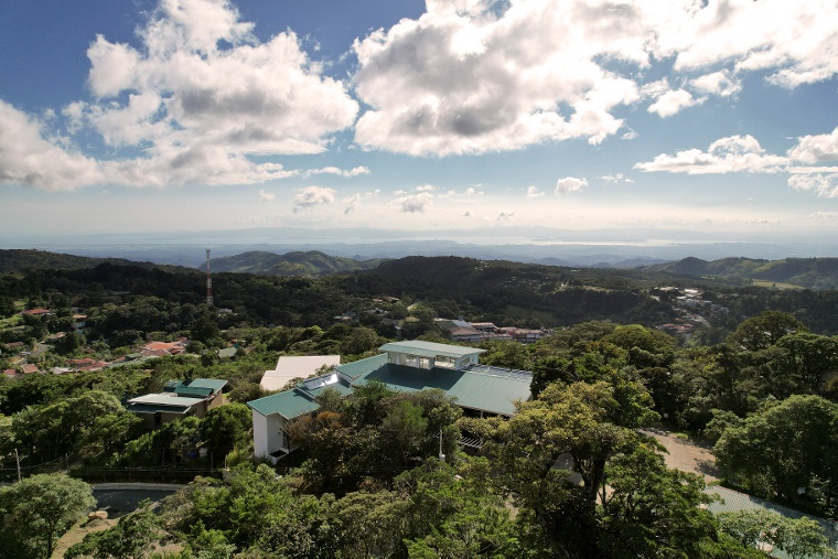 Drone Shot of Ocotea Boutique Hotel with the Nicoya Gulf in the Far Background